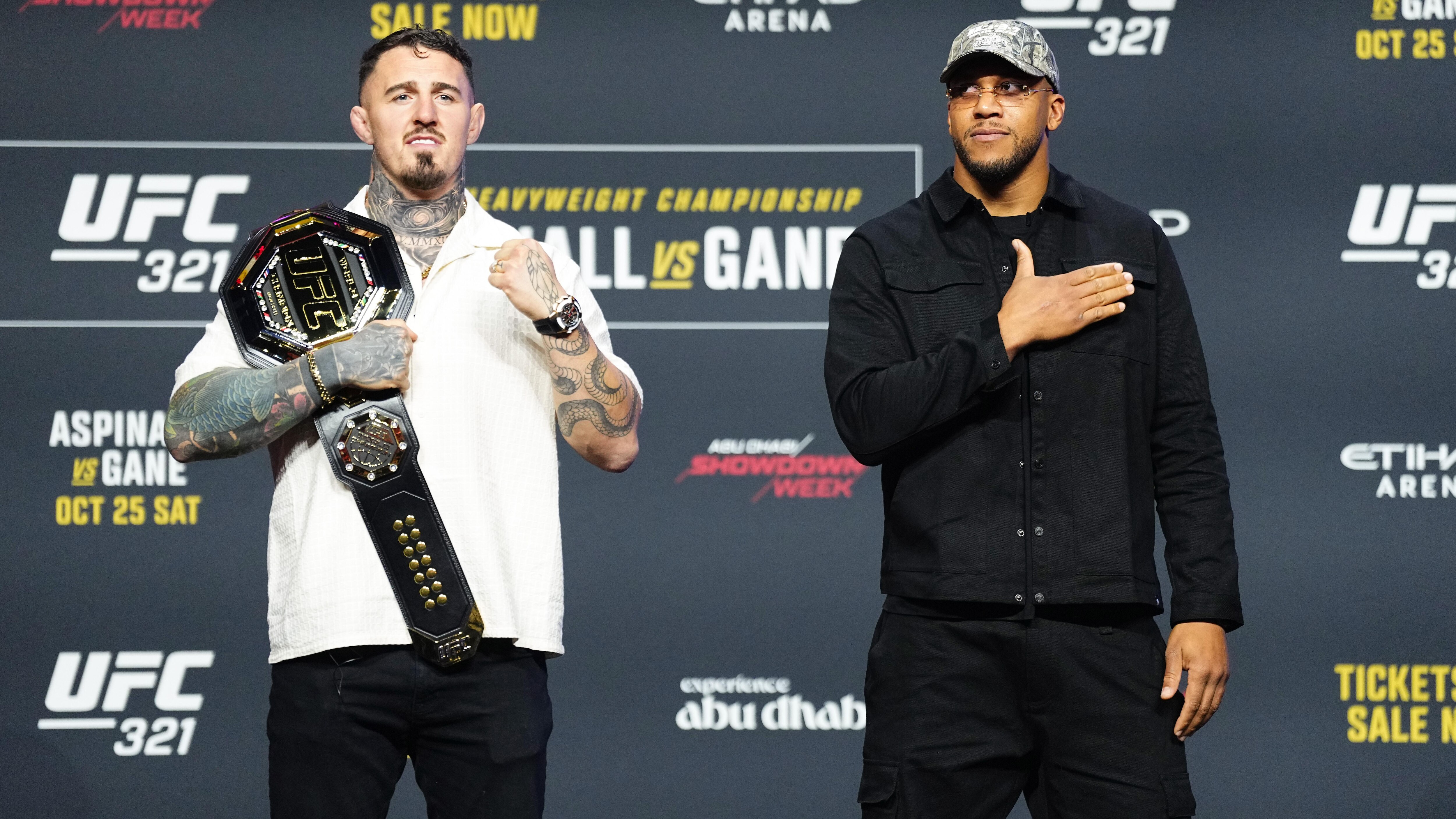 Tom Aspinall at a press conference with his UFC heavyweight belt